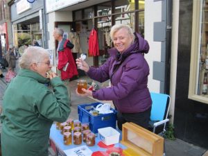 Selling honey at Conwy Honey Fair